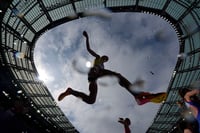 | Photo: AP/Matthias Schrader : Cara Feain-Ryan competes competes in women's 3000-meter steeplechase